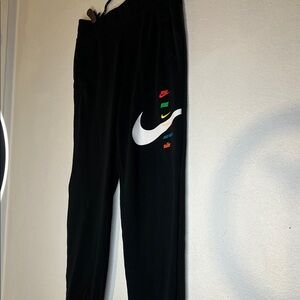 Nike Kids Black Joggers with Multicolor Logo